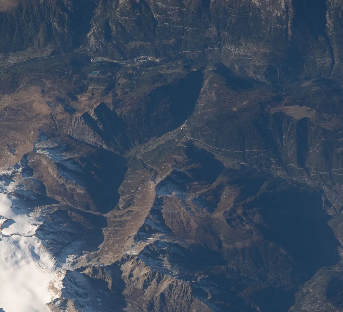 ISS065-E-484313 - View of Switzerland - Val de Trient - Trientgletscher (Glacier du Trient) - Plateau du Trient - Glacier des Grands - Les Grandes Otanes - L'Arolette - Le Génépi - Finhaut-Le-Châtelard - Col de la Forclaz (cropped)