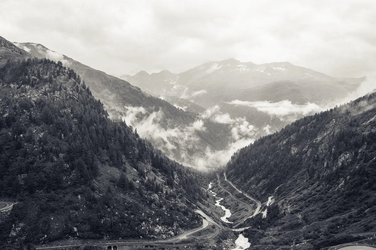 Foggy mountain pass (Unsplash)