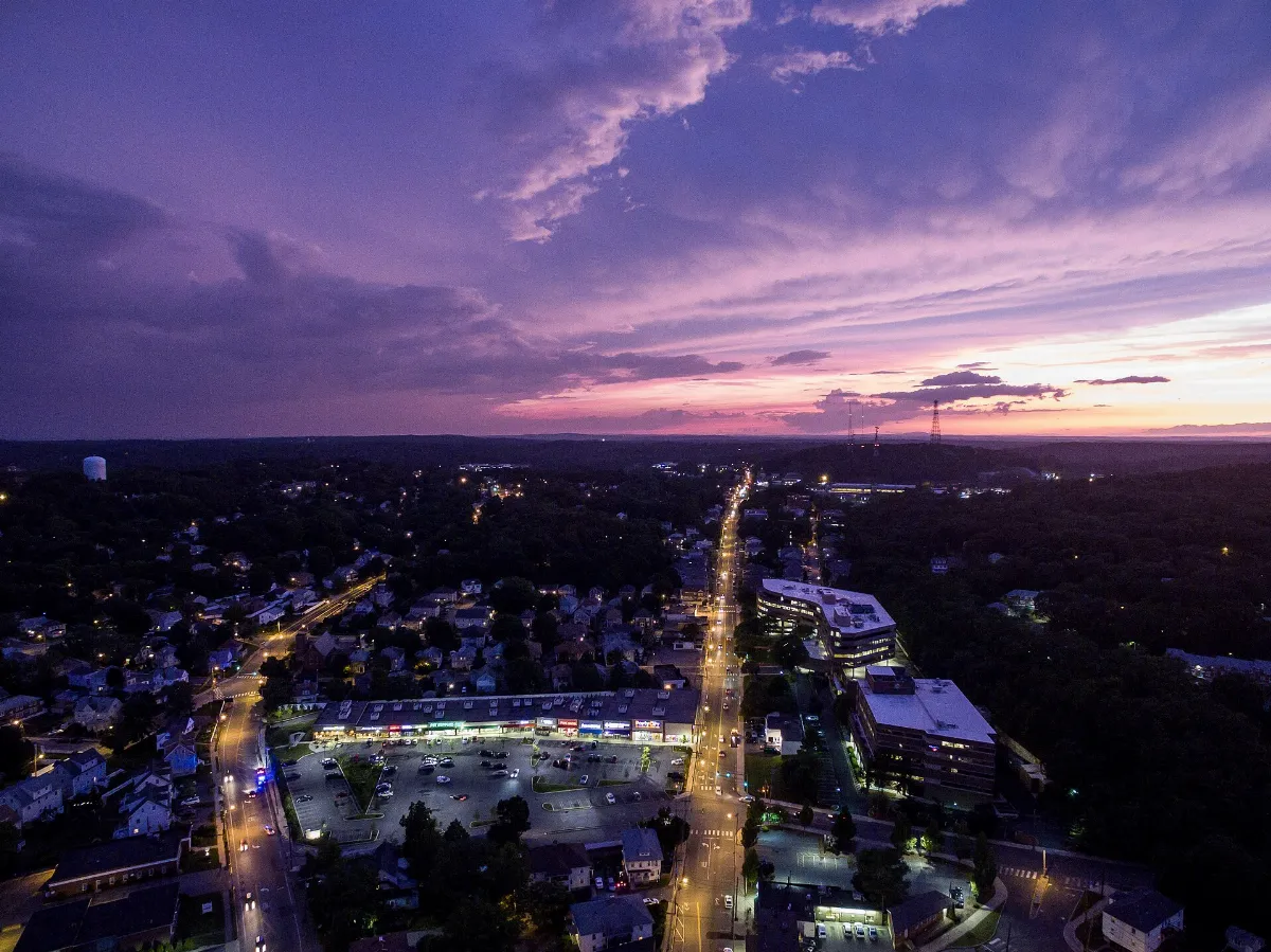 Aerial sunset view of strip mall in Waltham, June 2015
