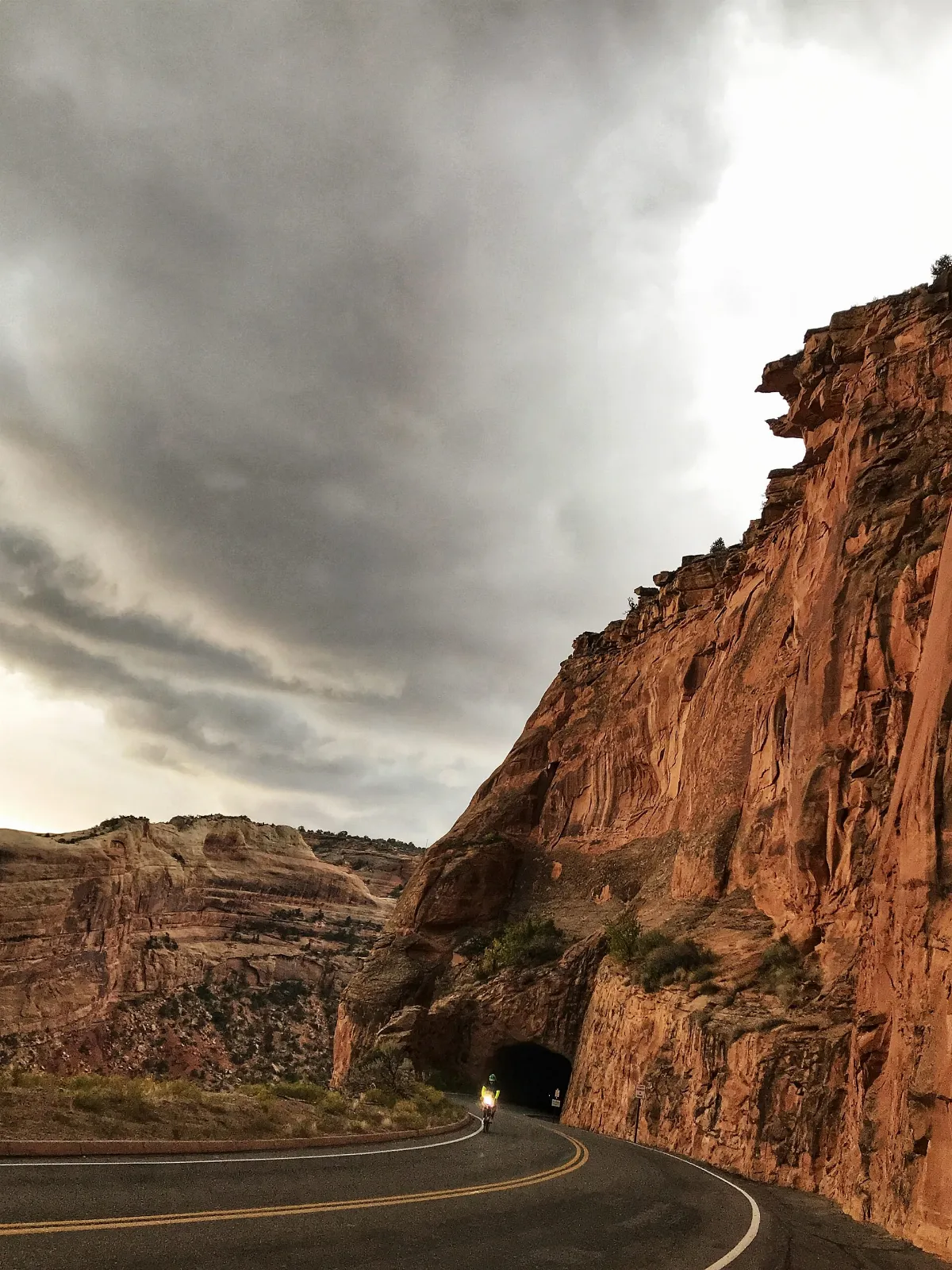 Colorado National Monument tunnel with cyclist