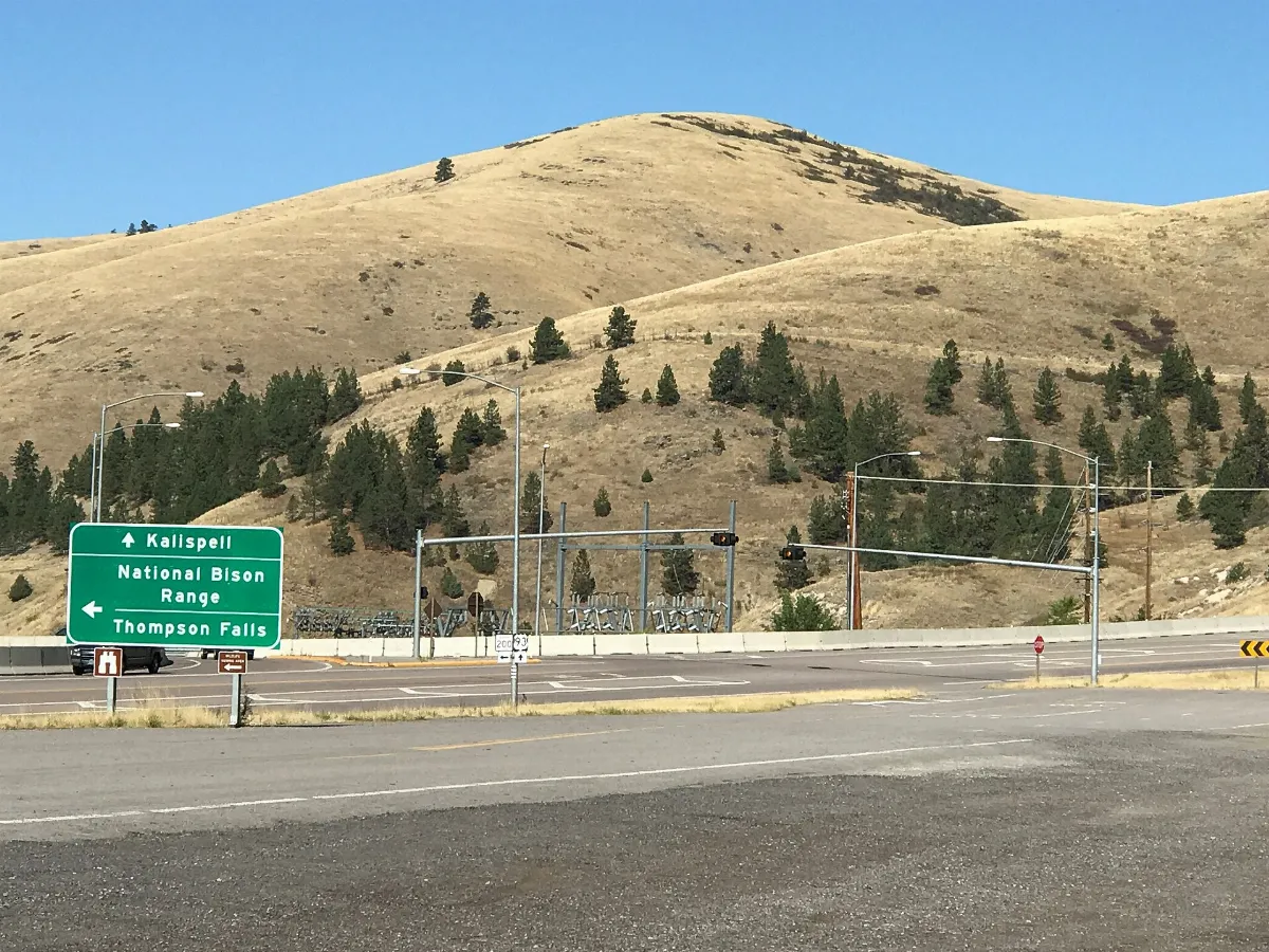 Road sign at junction of US Route 93 and Montana Highway 200 at Ravalli, Montana