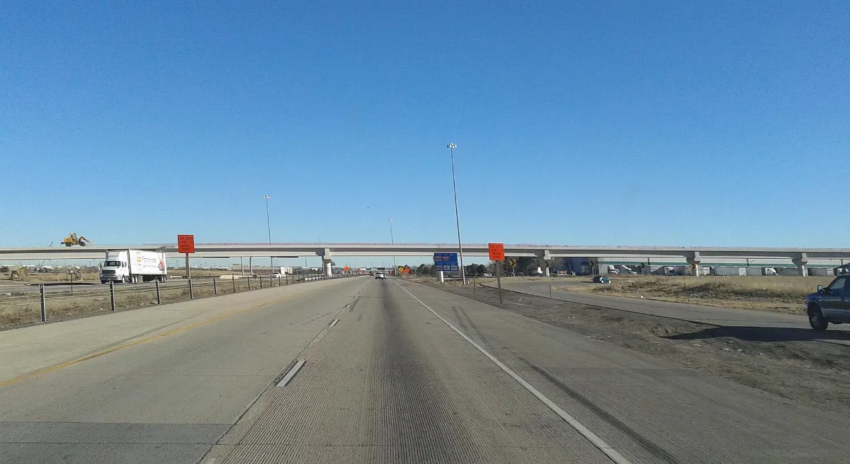 Interstate 70 EB under RTD commuter rail flyover bridge