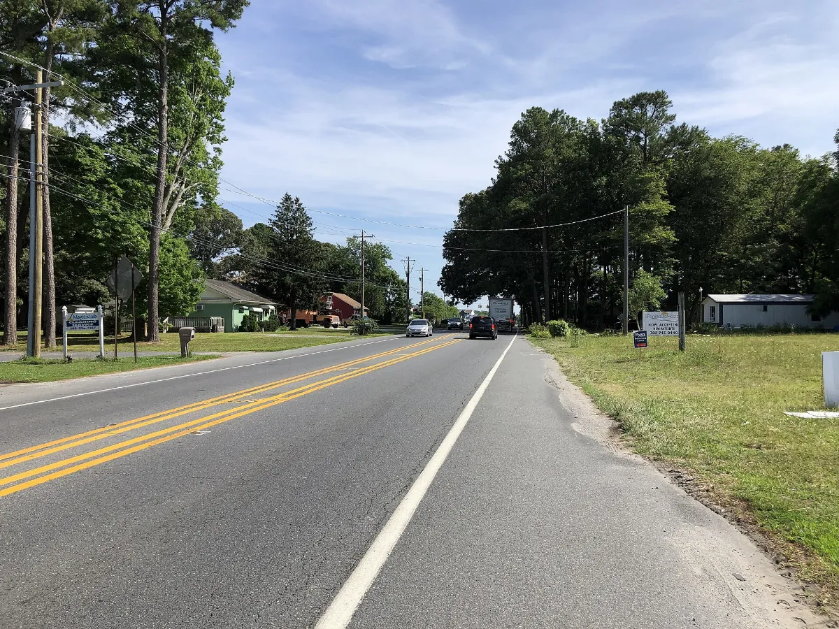 2022-07-08 16 16 17 View south along Delaware State Route 5 and west along Delaware State Route 24 (John J Williams Highway) at Tucks Road in Sherwood Forest, Sussex County, Delaware